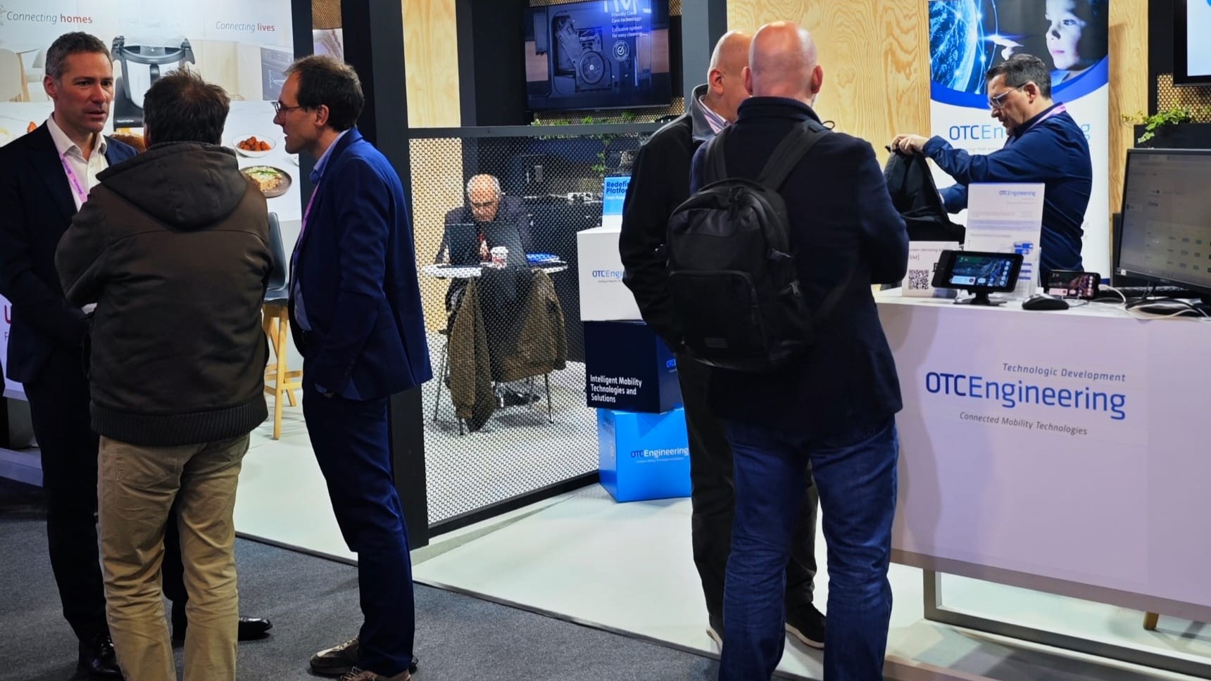 OTC Engineering team presenting engineering and digitalization solutions for connected mobility at their stand during Mobile World Congress Barcelona.